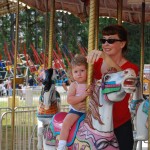 Katherine and Lily on the carousel